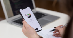 Person testing app prototype on phone
